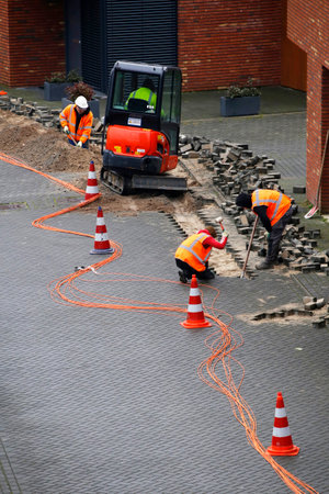Installation and connecting fiber optic cables to neighboring houses