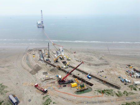 Connecting a seacable from a windpark to an onshore power hub