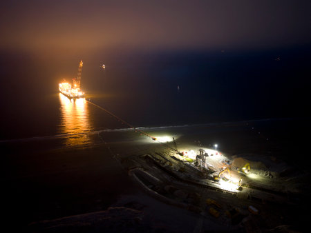 Connecting a seacable from a windpark to an onshore power hub using a large vesselの写真素材