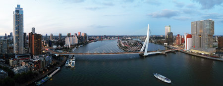 Panoramic view of the city of Rotterdam at sunsetの写真素材