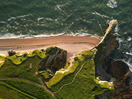 The famous limestone cliffs near Etretat at sunset, Franceの写真素材