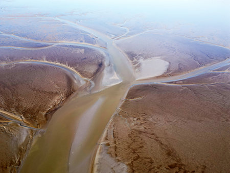 Aerial view of the tidal mudflats in the Eemsdelta, Hollandの写真素材