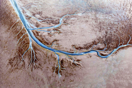 Aerial view of the tidal mudflats in the Eemsdelta, Holland