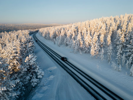 Winter road scenery in Finnish Laplandの写真素材