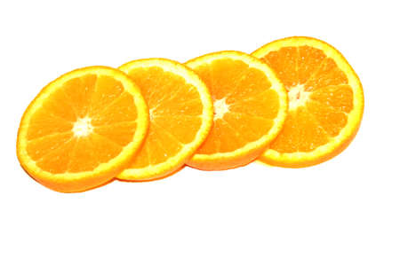 Orange Pieces On White Colored Backgroundの写真素材