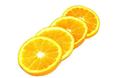 Orange Pieces On White Colored Backgroundの写真素材