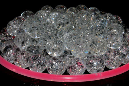 Fried Cracked Marbles On Black Background, Baked and heated in the oven to create cracks.の写真素材