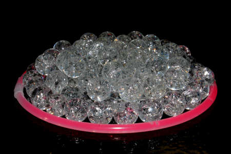 Fried Cracked Marbles On Black Background, Baked and heated in the oven to create cracks.の写真素材