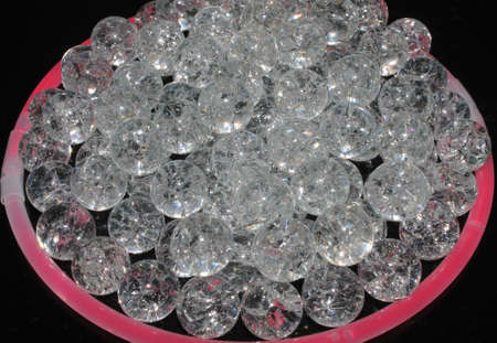 Fried Cracked Marbles On Black Background, Baked and heated in the oven to create cracks.の写真素材