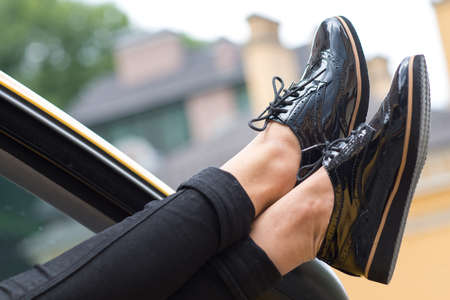 Close up of stylish female shoes.  Footwear advertising.の写真素材