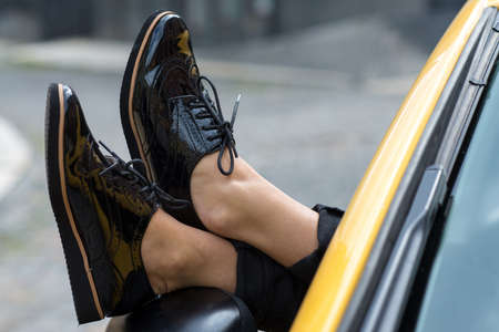 Close up of stylish female shoes.  Footwear advertising.の写真素材