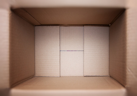 Cardboard box for parcels inside, look inside.の写真素材