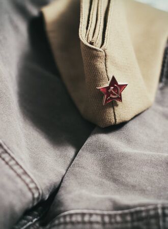 Uniform cap of a Soviet soldier of the WWII with a star. In memory of Victory Day on May 9th.の写真素材