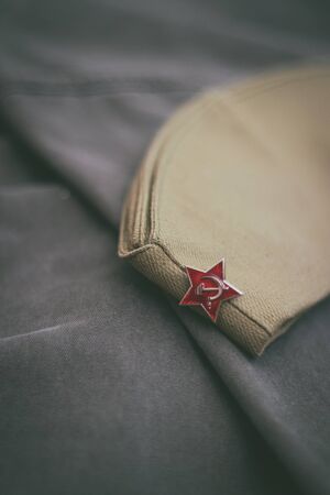 Uniform cap of a Soviet soldier of the second world war with a star. In memory of Victory Day on May 9th.の写真素材