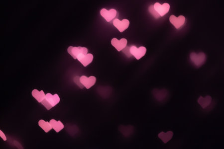 Heart shaped bokeh background. Great to use on Valentines Day.の写真素材
