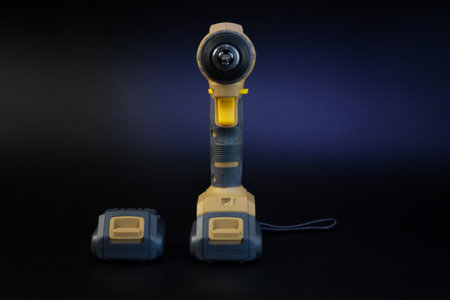 Cordless brushless screwdriver on black background