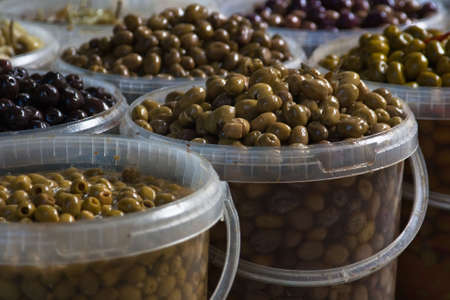 Gourmet olives for sale at an outdoor Paris marketの写真素材