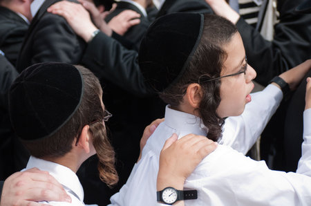 Jewish religious children dancing in Jerusalem in October for Succot holidayのeditorial素材