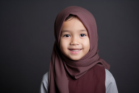 Portrait of a cute little asian muslim girl wearing hijabの素材