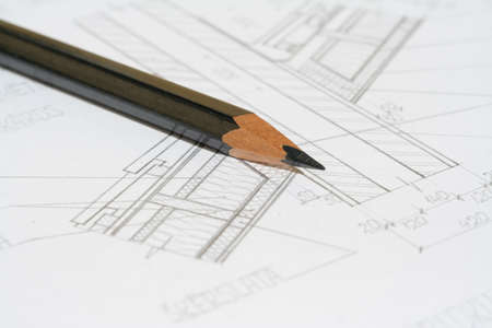 a pencil on a drawingの写真素材