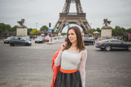 Sexy young brunette travelling in France in white lace topの写真素材