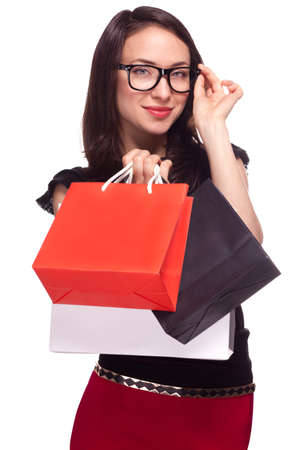 Shopping sale woman with bags isolated on whiteの写真素材