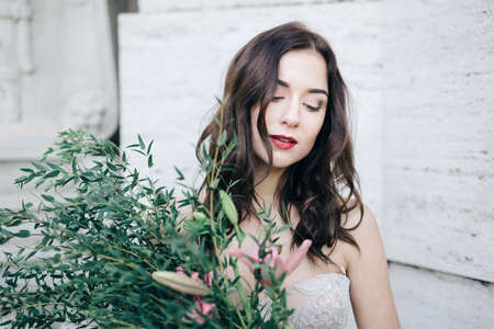 Bride fashion with romantic flower bouquet in Romeの写真素材