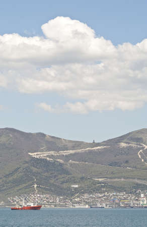 Red ship in the bayの写真素材