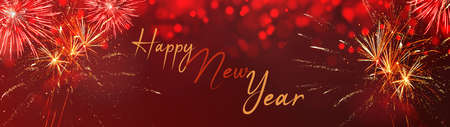 HAPPY NEW YEAR 2022 - Silvester background panorama banner long - Firework on red texture with bokeh lights and space for textの写真素材
