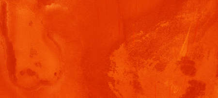 Abstract grunge orange colored scratched painted paper concrete cement stone texture backgroundの写真素材