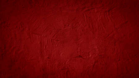 Abstract red old aged retro vintage painted paper concrete cement facade plaster wall texture backgroundの写真素材