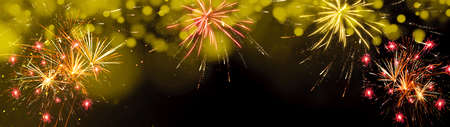 FIREWORKS background banner panorama - Colorful festive firework with golden yellow bokeh in summer...