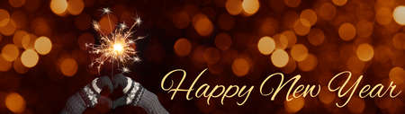 Silvester / Party / New Year background banner panorama - Happy girl / woman holds a sparkling...