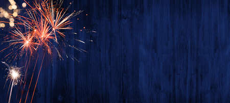 New Year's background - firework on rustic dark blue night sky texture, New Year's Eveの写真素材