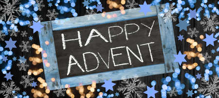 Happy Advent background banner template - Top view from Chalkboard, bokeh lights, stars and ice crystals, isolated on dark black rustic wooden boards wall textureの写真素材