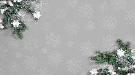 Festive decorative Christmas / Advent background - Fir branches, snowflakes and ice crystals, isolated on gray gray paper texture, top view / above view with space for textの写真素材