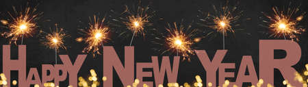 Pink HAPPY NEW YEAR letters lettering, golden bokeh lights and sparkling sparklers, in the dark black night - New Year's Eve Party 2022 Holiday festive celebration background banner panorama longの写真素材