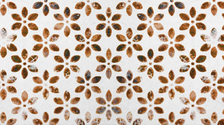 White vintage shabby tiles texture with brown orange flower blossom motif print Background texture