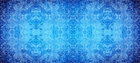 Old blue indigo vintage shabby damask floral flower patchwork tiles stone concrete cement wallwallpaper texture background bannerの写真素材