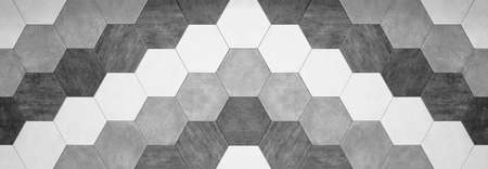 Abstract seamless bright white gray gray anthracite concrete cement stone tile wall made of hexagonal geometric hexagon print texture background banner panoramaの写真素材