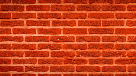 Orange abstract colorful damaged rustic brick wall brickwork stonework masonry texture background patternの写真素材