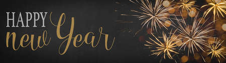 HAPPY NEW YEAR 2022 New Year's Eve Holiday Event Party Silvester background panorama banner - Fireworks and Typography on dark black night sky textureの写真素材