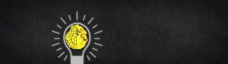 BRAINSTORMING business concept, Creative idea and innovation background banner panorama - Crumpled paper and brain as light bulb on dark blackboard textureの写真素材