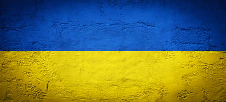 Abstract concrete stone wall texture background, in the colors of the flag of Ukraine