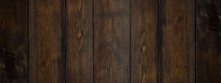 Old brown rustic dark grunge wooden timber wall or floor or table texture - wood background bannerの写真素材