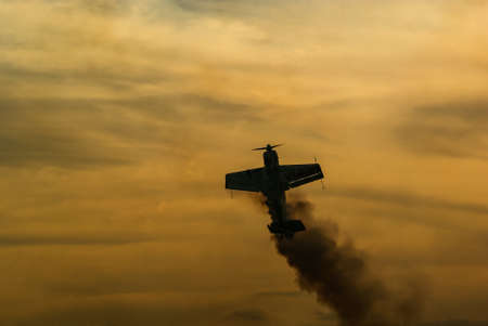 Acrobatic plane on beautiful sunset skyのeditorial素材