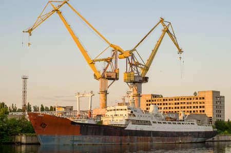 shipyard with floating dock and ship (slow speed, do not moor)