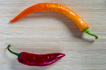 red hot chili peppers on woodenの写真素材