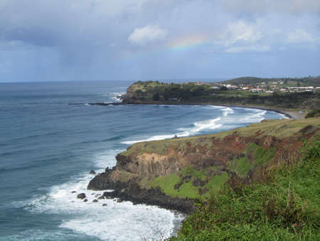 Sunset over beautiful ocean cliff landscape