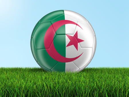 Soccer football with Algerian flag on grass. Image with clipping pathの写真素材
